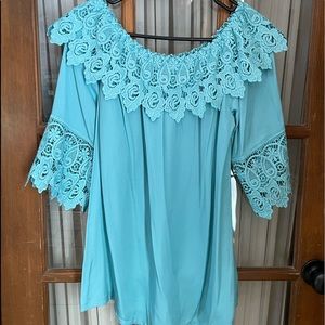 Aqua colored tunic with lace